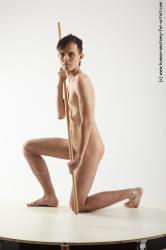 Nude Fighting with spear Man White Kneeling poses - ALL Slim Short Brown Kneeling poses - on one knee Realistic